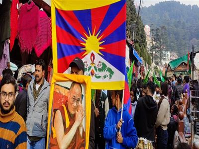 Tibetan women hold candle march to mark anniversary of 64th national uprising in Shimla
