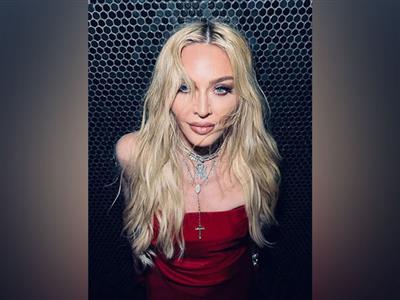Madonna returns to Met Gala, hits red carpet with a cigar