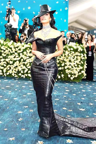Met Gala: Kim Kardashian has awkward moment with security guard who trips on her gown