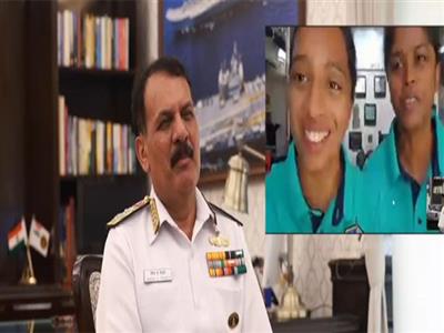 Navy Chief Admiral Dinesh K Tripathi interacts with crew of Navika Sagar Parikrama II onboard INSV Tarini