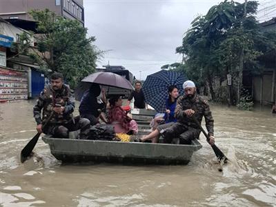Security personnel rescue people stranded in floods in Northeastern states