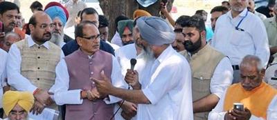 Union Minister Shivraj Singh Chouhan drives tractor, urges water-saving methods