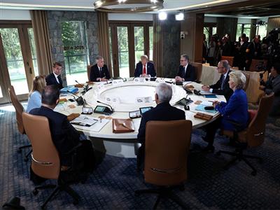 G7 leaders pledge joint action to tackle migrant smuggling