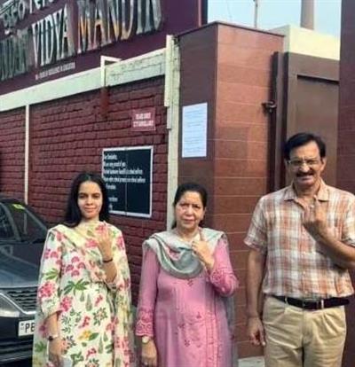 BJP leader Anil Sarin casts vote along with family