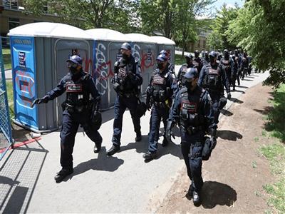 Toronto police arrest six at Christie Pits Park during pro and anti-immigration rival rallies
