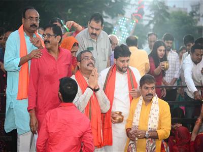 Union Minister Dharmendra Pradhan offers 'Usha Arghya' on conclusion of Chhath Puja