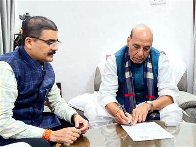 UP: Defence Minister Rajnath Singh fills out enumeration form for SIR in Lucknow