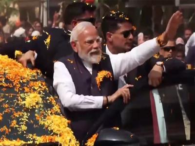 PM Modi holds roadshow in Udupi after addressing Laksha Kantha Gita Parayana programme at Sri Krishna Matha