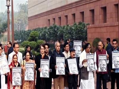 Members of the opposition stage protest against VB G-RAM-G Bill in Parliament