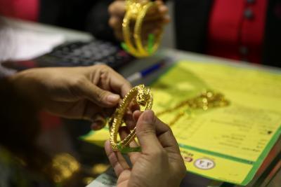 Gold, silver prices slip amid profit booking, dollar gains