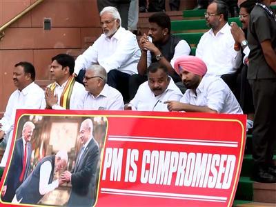 Parliament Budget Session: Oppn MPs stage protest at Makar Dwar, hold 'PM is compromised' banner