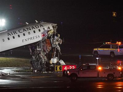 Six injured in the Air Canada Express plane collision at New York's La Guardia's Airport