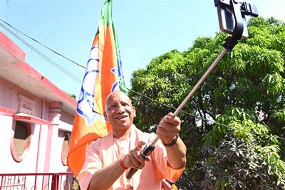 Uttar Pradesh CM Yogi hoists BJP flag at Gorakhnath temple on 47th foundation day in Gorakhpur