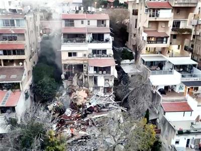 Israel: 2 dead, 2 missing after missile strike on Haifa residential building