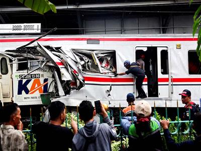 At least seven dead as high-speed train slams into stalled commuter service near Jakarta