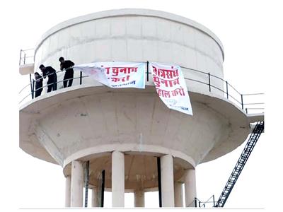 Rajasthan: NSUI activists climb water tank in Jaipur over student union elections demand