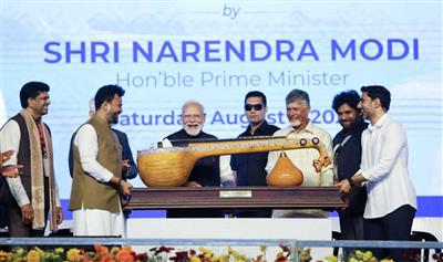 PM Modi receives handcrafted Bobbili Ekanda Veena during Bhogapuram airport inauguration; lauds Andhra Pradesh artisans