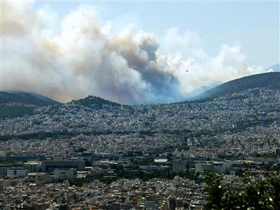 Two helicopters collide while battling major wildfire near Athens