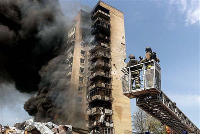 Russian attacks kill one in Ukrainian capital Kyiv, trigger fires