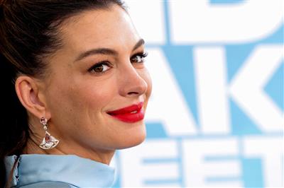 Anne Hathaway looks beautiful as she flaunts her baby bump at LA premiere of 'The End of Oak Street'