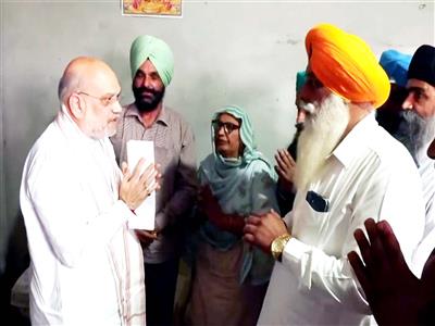 Amit Shah meets family of Bikramjit Singh in Gurdaspur, allegedly killed for raising voice against drug trade